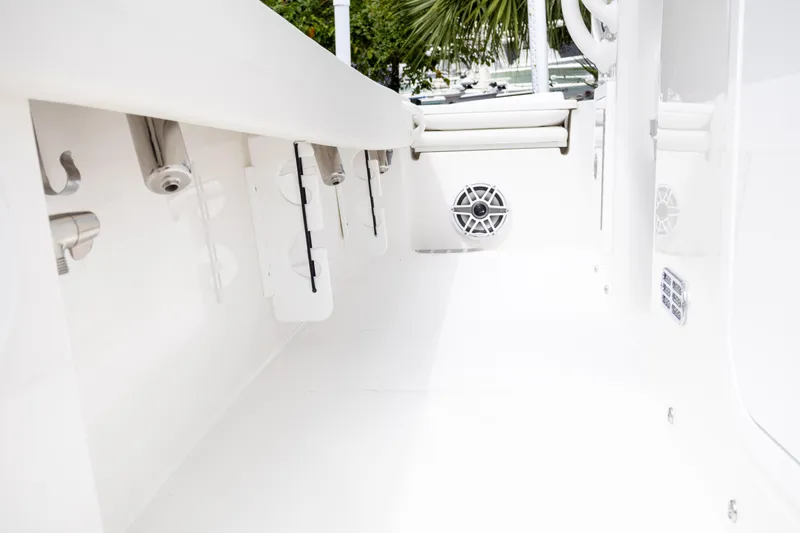 Slide: The Image of 2025 Regulator 26XO boat interior with white finish and speaker system. - 28