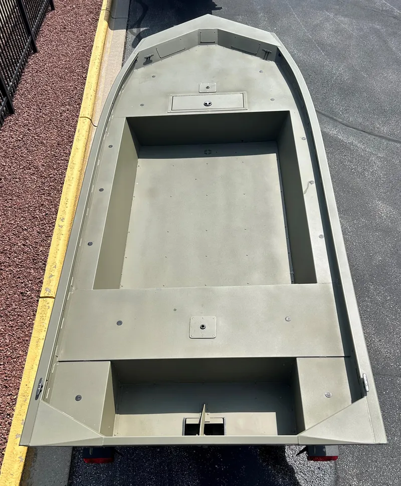 Slide: The Image of 2025 Tracker Grizzly 1754 AWL boat, top view, showing spacious interior and durable design. - 3