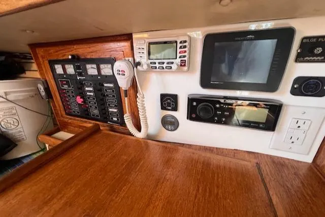 Slide: The Image of Navigation and control panel of a 1992 Pacific Seacraft 37 Cutter sailboat. - 26