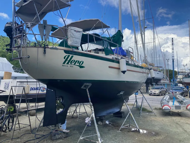 Slide: The Image of 1992 Pacific Seacraft 37 Cutter sailboat on stands in a boatyard. - 46