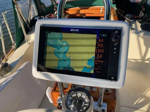 Slide: The Image of Navigation system on a 1992 Pacific Seacraft 37 Cutter sailboat, displaying a nautical chart. - 25
