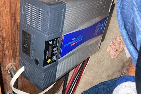 Slide: The Image of Inverter installed on 1992 Pacific Seacraft 37 Cutter, showing power outlets and wiring. - 35