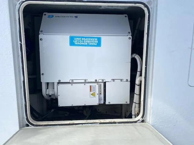 Slide: The Image of Electrical panel inside 1985 Bertram 38 Convertible boat compartment. - 15