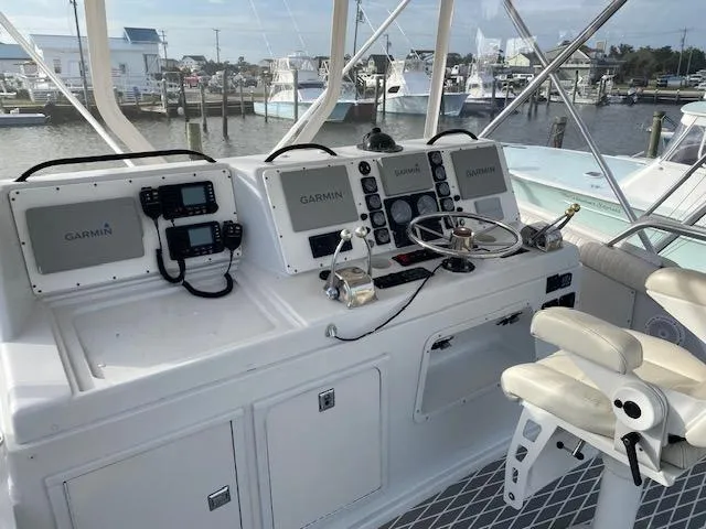 Slide: The Image of 1985 Bertram 38 Convertible helm with Garmin electronics and dual captain chairs. - 18