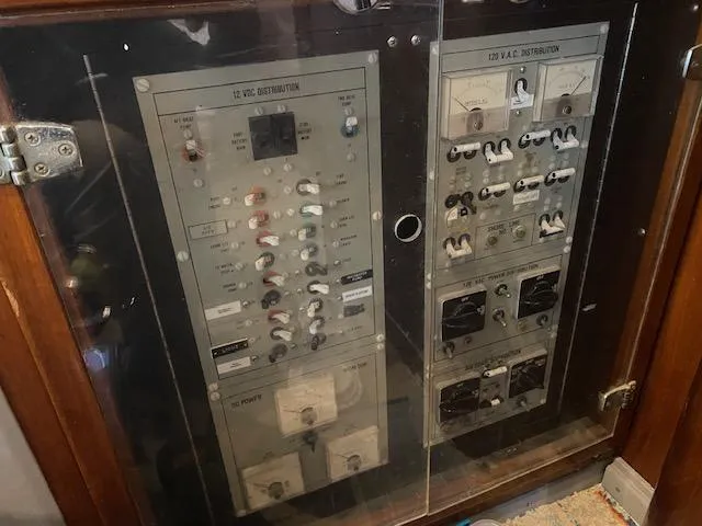 Slide: The Image of Electrical panel on a 1985 Bertram 38 Convertible boat. - 33