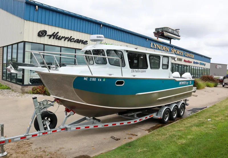 The Image of 2024 Hewescraft 270 Pacific Explorer boat on trailer at Lynden Sports Center. - 0