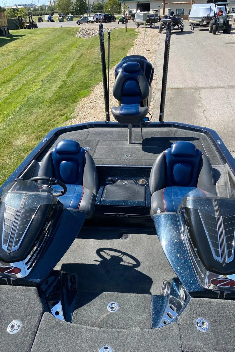 Slide: The Image of 2015 Ranger Z521C boat interior with dual seats and steering wheel. - 3