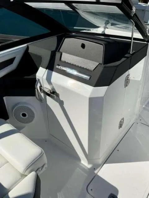 Slide: The Image of 2025 Cobalt R8 boat interior with sleek design and modern features. - 13