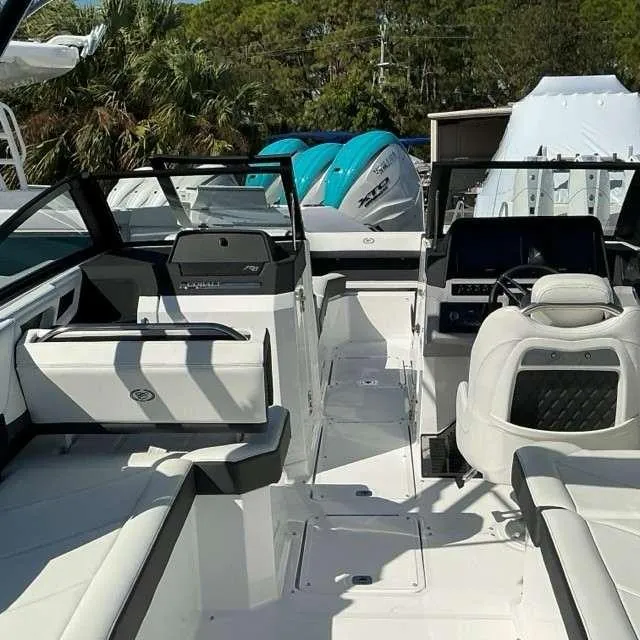 Slide: The Image of 2025 Cobalt R8 boat interior with modern seating and dashboard. - 14