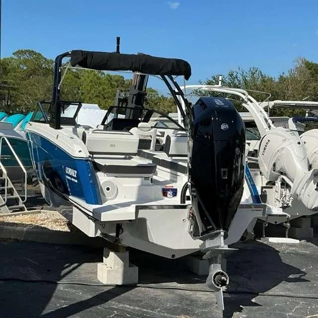 Slide: The Image of 2025 Cobalt R8 boat with outboard motor on display. - 2