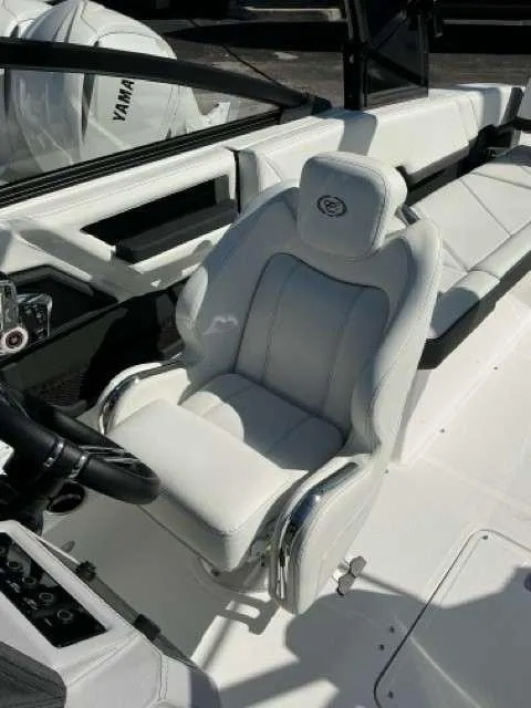 Slide: The Image of 2025 Cobalt R8 boat interior with luxurious white seating. - 6