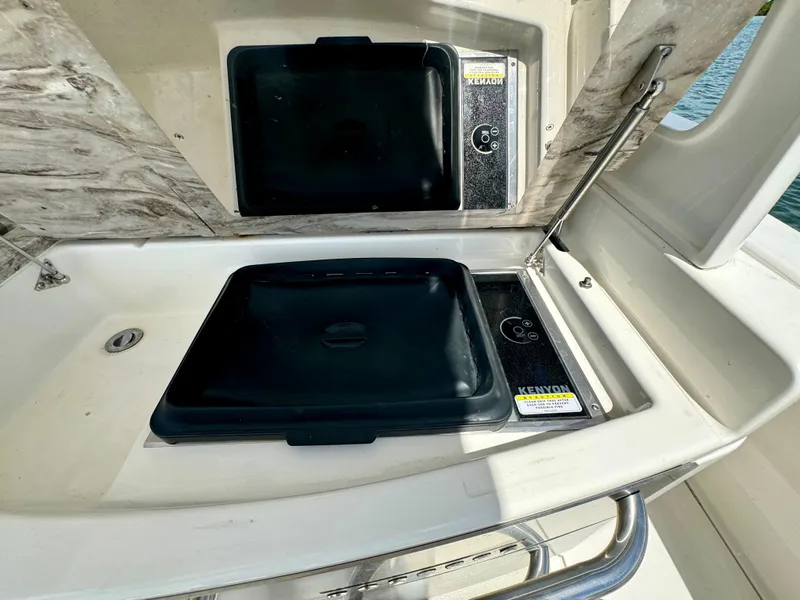 Slide: The Image of Outdoor kitchen on 2020 Solace 345 boat with stove and sink. - 47