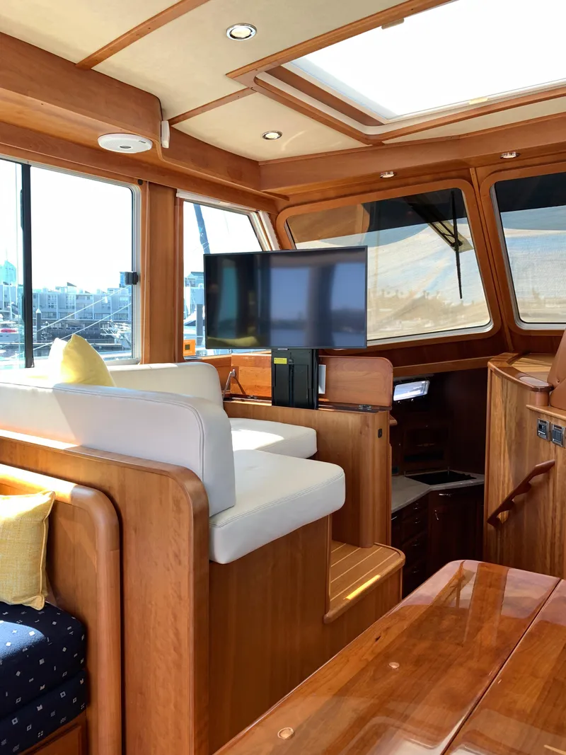 Slide: The Image of Interior of 2014 Sabre 48 Salon Express yacht with wood finish and modern amenities. - 42