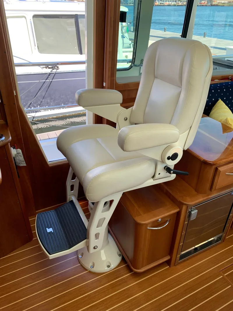 Slide: The Image of Captain's chair in 2014 Sabre 48 Salon Express yacht interior. - 45