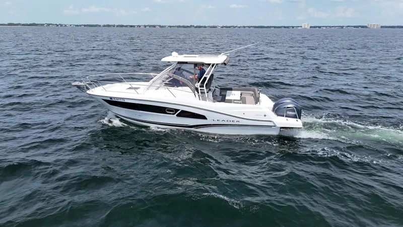 The Image of 2022 Jeanneau Leader 9.0 WA cruising on open water. - 0