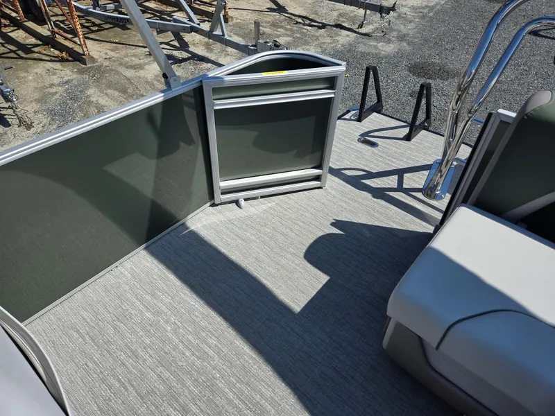 Slide: The Image of 2025 Godfrey Sweetwater 2286 C pontoon boat interior with seating and flooring. - 19