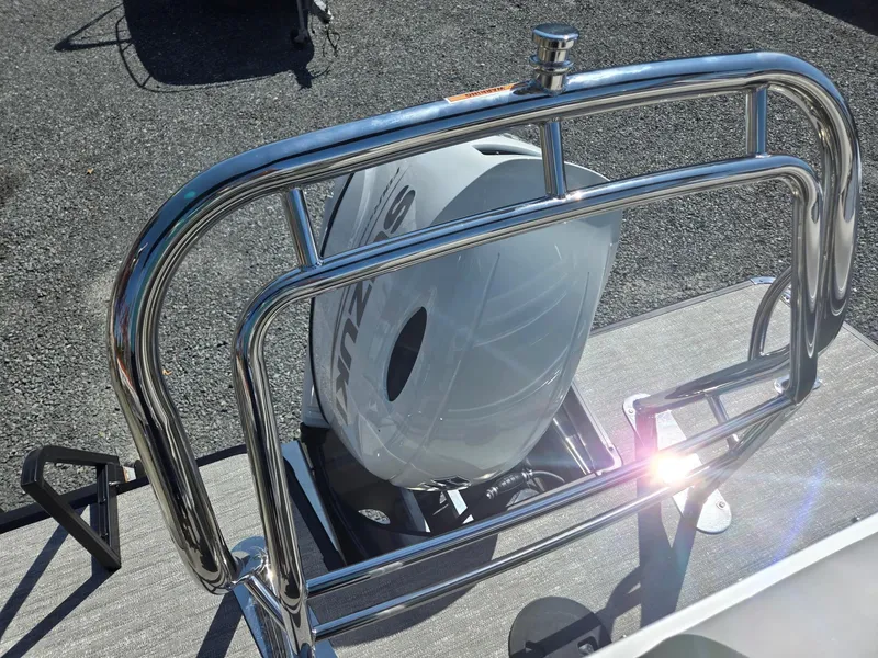 Slide: The Image of 2025 Godfrey Sweetwater 2286 C boat with chrome railing and life preserver. - 23