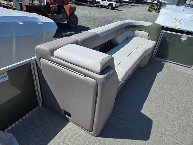 Slide: The Image of 2025 Godfrey Sweetwater 2286 C pontoon boat interior with plush seating. - 32