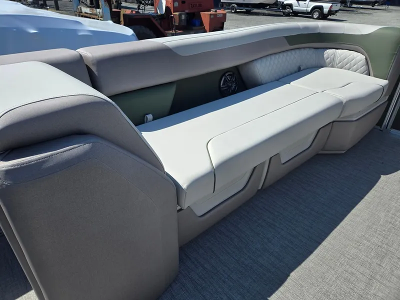 Slide: The Image of 2025 Godfrey Sweetwater 2286 C boat interior with plush seating and modern design. - 35