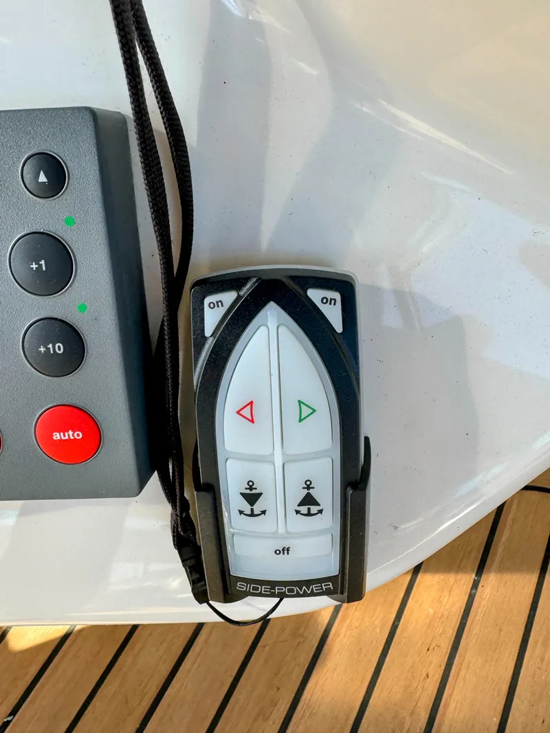 Slide: The Image of Boat control panel with Side-Power thruster remote on 2001 Sea Ray 400 Sedan Bridge. - 17