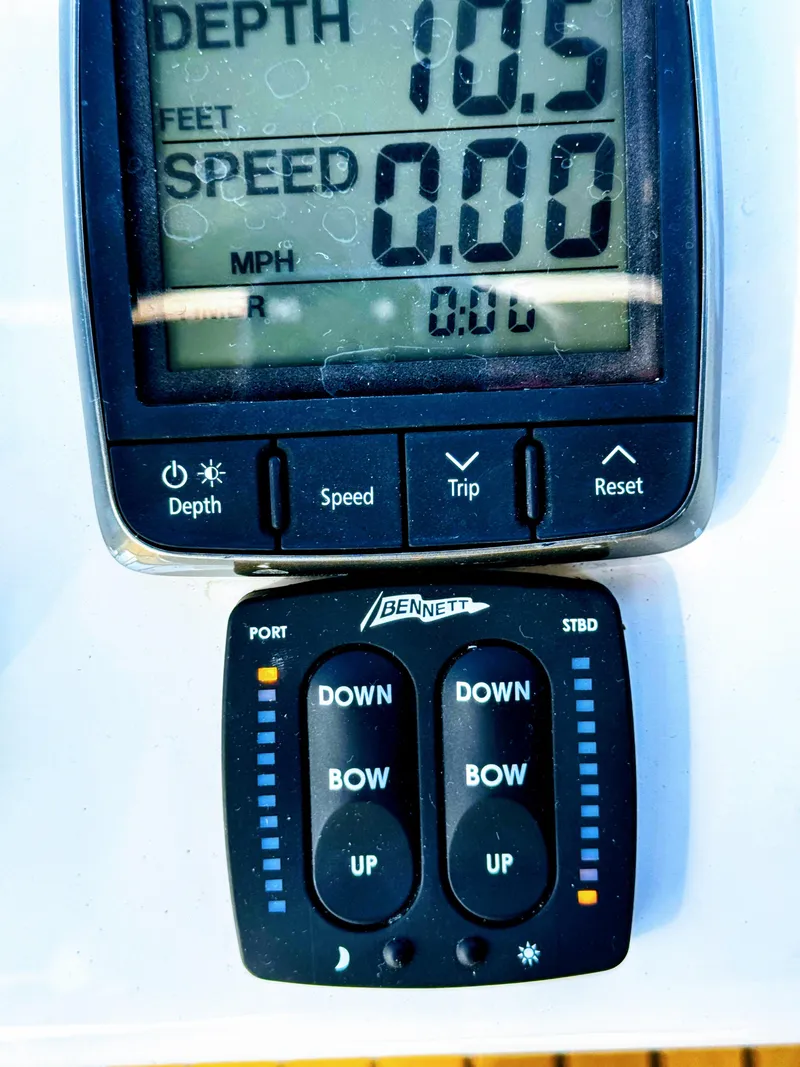 Slide: The Image of Boat control panel showing depth and speed, Sea Ray 400 Sedan Bridge 2001. - 23