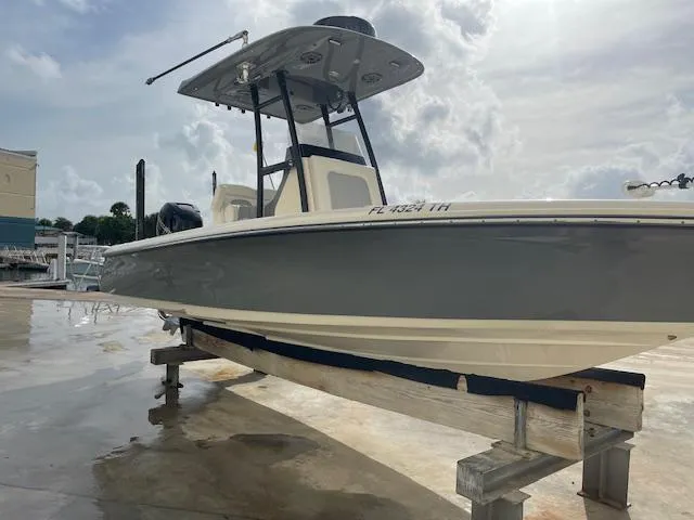 The Image of 2022 ShearWater 25 boat on dock under cloudy sky. - 0