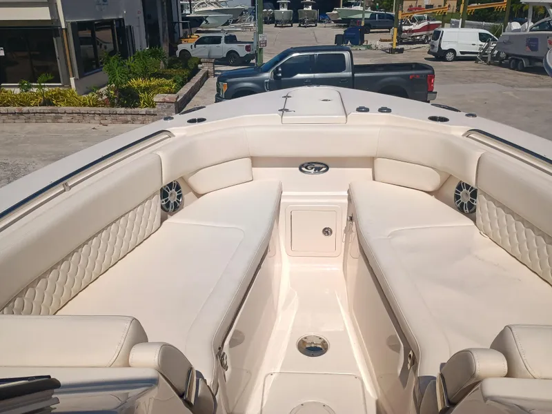 Slide: The Image of 2025 Grady-White Freedom 307 boat interior with luxurious seating and modern design. - 6