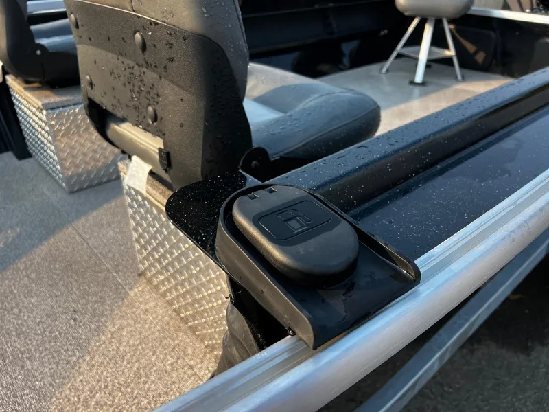 Slide: The Image of Fish Rite Angler 18 boat interior, featuring seating and aluminum flooring, 2025 model. - 15