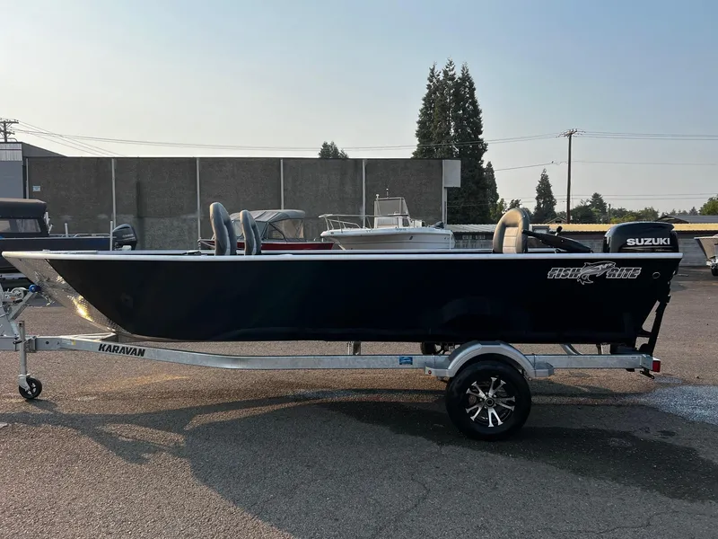 Slide: The Image of 2025 Fish Rite Angler 18 boat with Suzuki engine on trailer. - 5