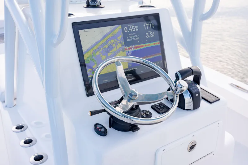 Slide: The Image of Steering console of 2021 ZCB 26 Freemason boat with navigation display. - 15