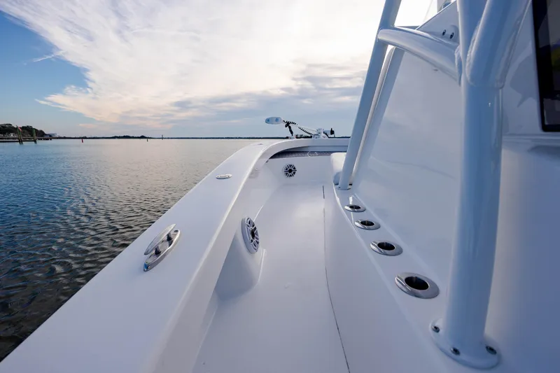 Slide: The Image of ZCB 26 Freemason boat on calm water, showcasing sleek design and modern features, 2021 model. - 18