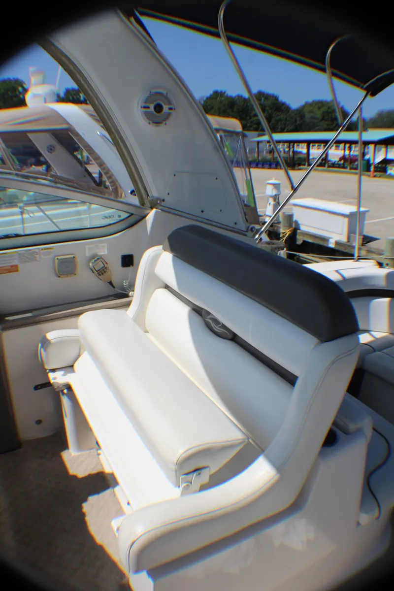 Slide: The Image of 2007 Rinker 350 Express Cruiser interior seating with modern design and comfortable upholstery. - 5