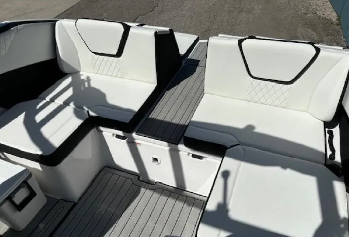 Slide: The Image of 2025 Yamaha Boats 222SD interior with white seating and modern design. - 14