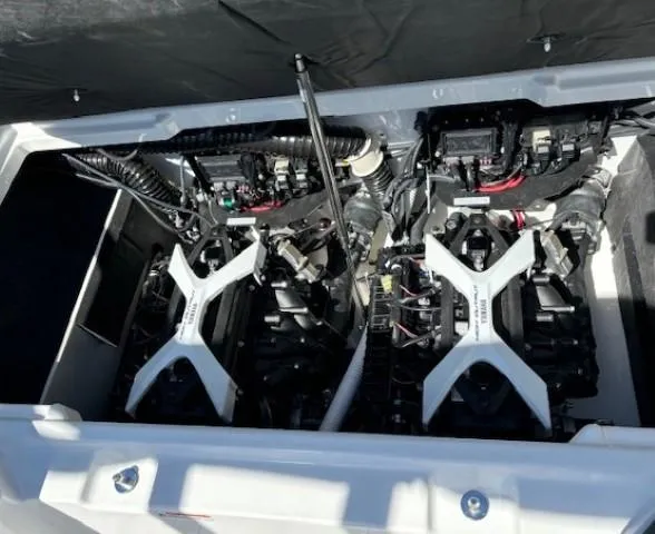 Slide: The Image of 2025 Yamaha Boats 222SD engine compartment showcasing dual engines and components. - 15