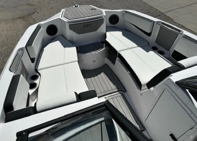 Slide: The Image of 2025 Yamaha Boats 222SD interior with white seating and modern design. - 8