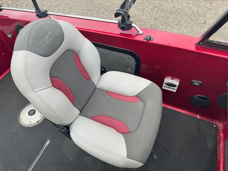 Slide: The Image of Red and gray seat in 2014 Skeeter WX 2060 boat interior. - 8