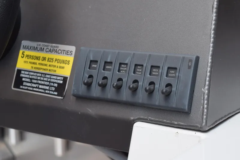 Slide: The Image of Control panel of 2024 Stabicraft 1550 Frontier SportFish with capacity label. - 10