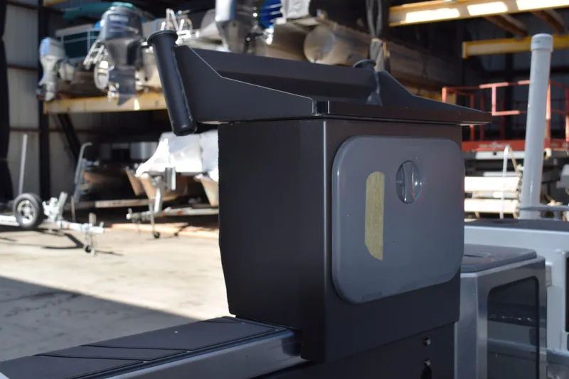 Slide: The Image of 2024 Stabicraft 1550 Frontier SportFish boat detail in a workshop setting. - 13