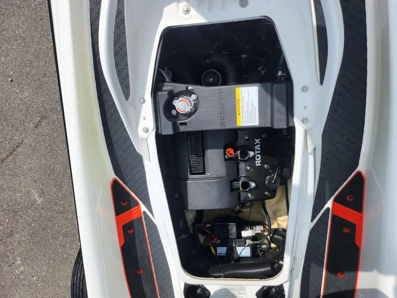 Slide: The Image of 2016 Sea-Doo RXT-X aS 260 engine compartment with visible Rotax engine components. - 11