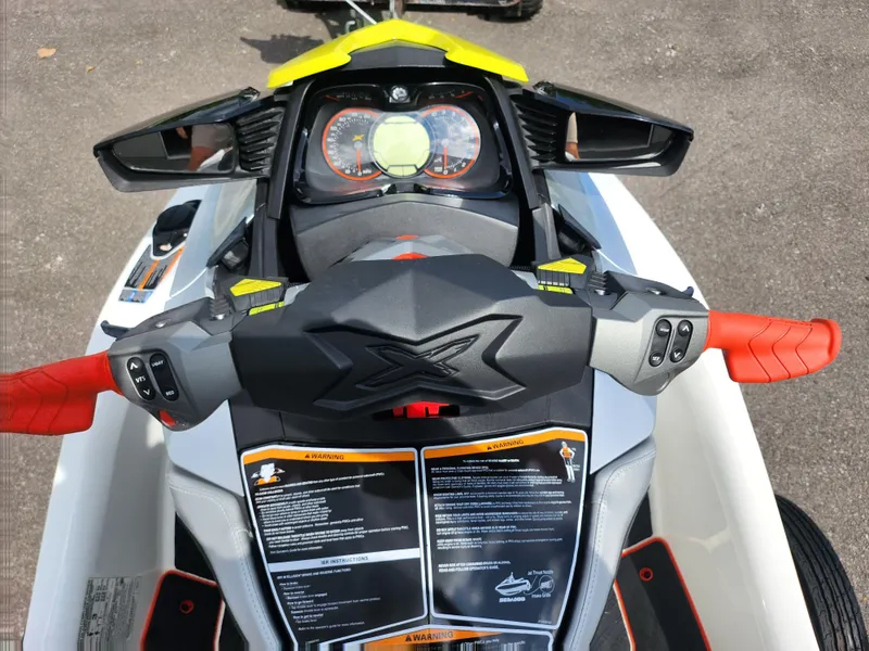 Slide: The Image of 2016 Sea-Doo RXT-X aS 260 dashboard with vibrant controls and display. - 12