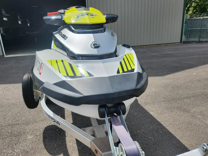 Slide: The Image of 2016 Sea-Doo RXT-X aS 260 jet ski on trailer, parked outdoors. - 6