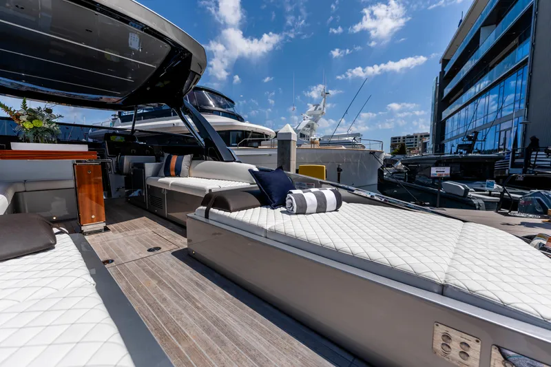 Slide: The Image of Luxurious 2024 Riva 48 Dolceriva yacht with elegant deck seating and modern design. - 15