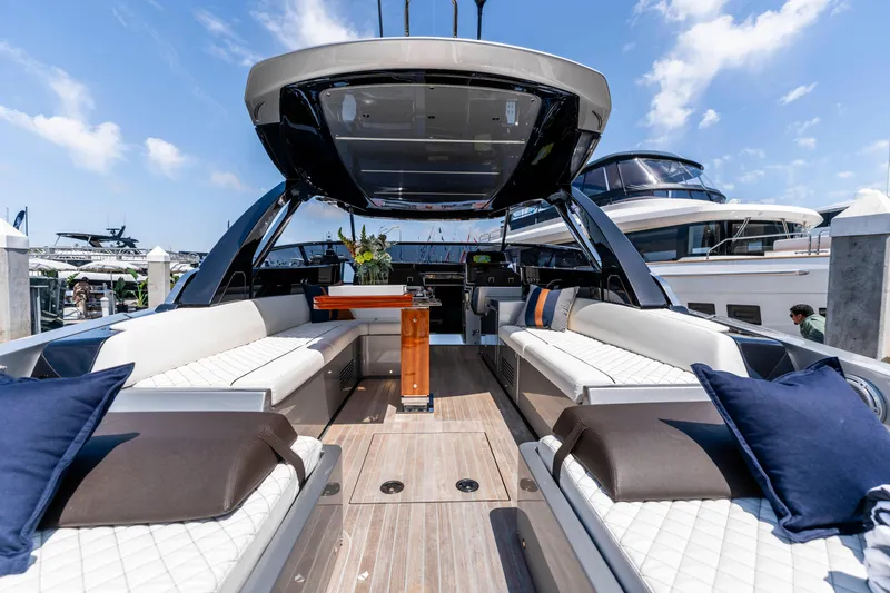 Slide: The Image of Luxurious 2024 Riva 48 Dolceriva yacht interior with elegant seating and modern design. - 16