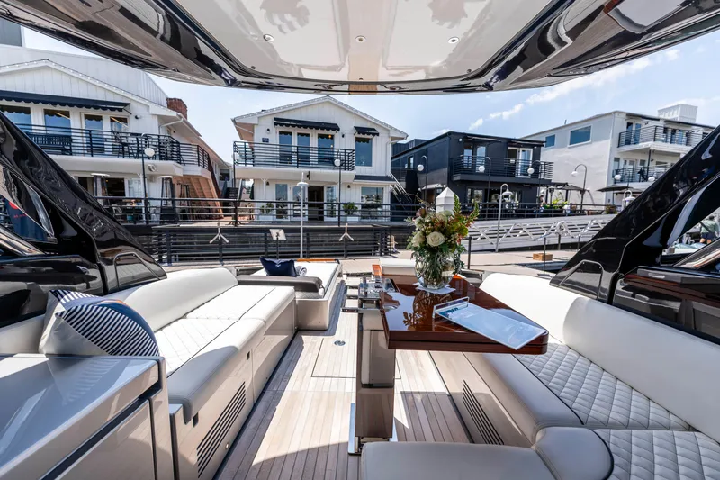 Slide: The Image of Luxurious interior of 2024 Riva 48 Dolceriva yacht with elegant seating and waterfront view. - 19
