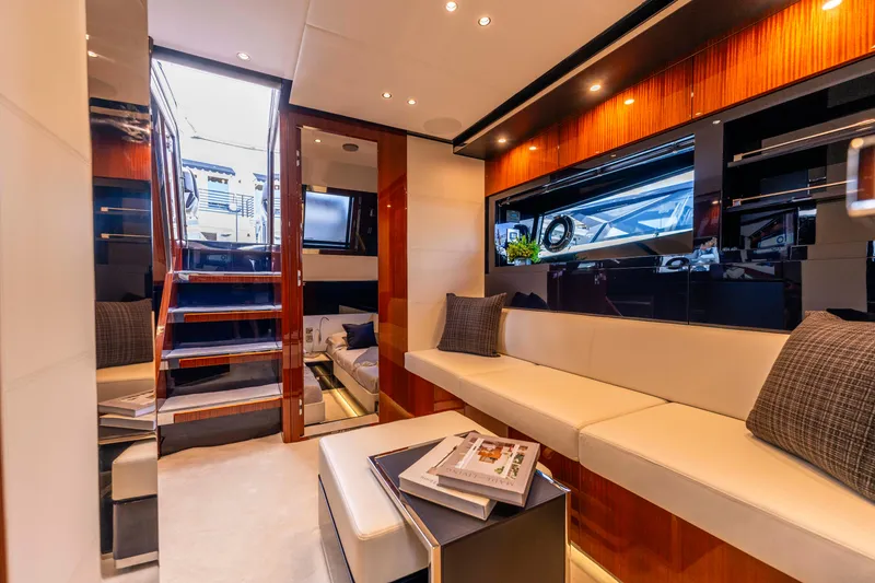 Slide: The Image of Luxurious interior of 2024 Riva 48 Dolceriva yacht with elegant seating and modern design. - 24