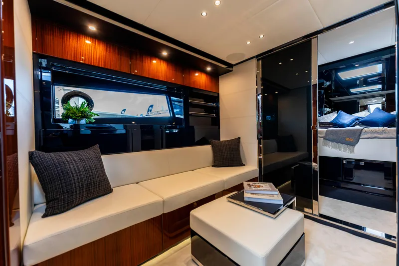 Slide: The Image of Luxurious interior of 2024 Riva 48 Dolceriva yacht with modern seating and elegant decor. - 26