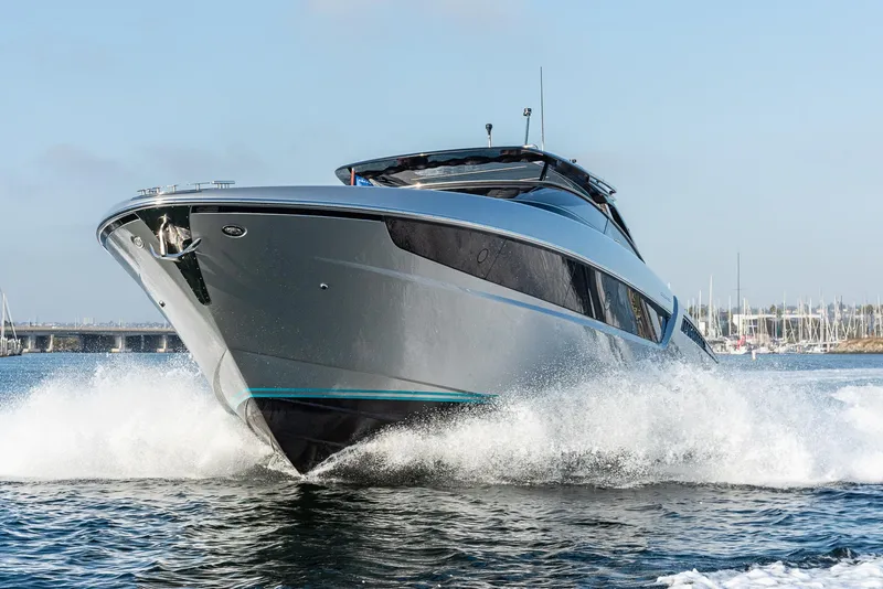 Slide: The Image of 2024 Riva 48 Dolceriva yacht cruising on open water, showcasing sleek design and luxury. - 3