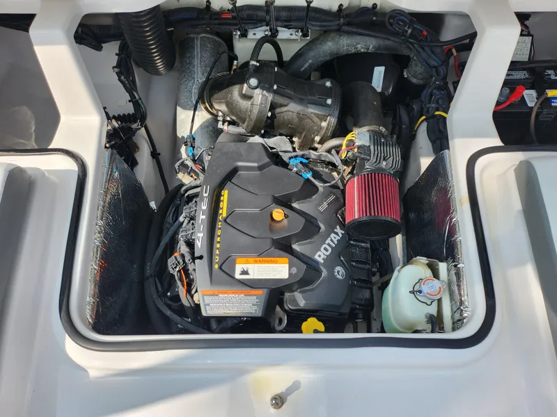Slide: The Image of 2017 Scarab 195 engine compartment with Rotax engine and components. - 22