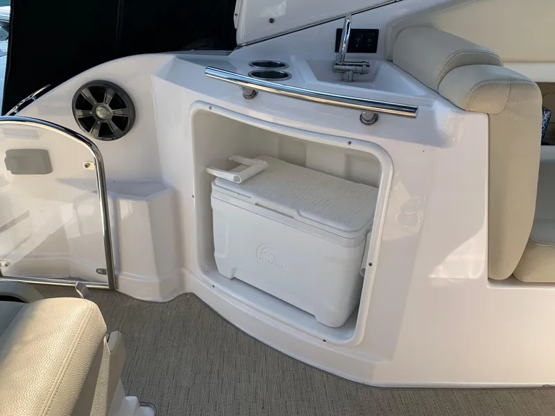 Slide: The Image of Interior of 2018 Regal 28 Express with cooler. - 18