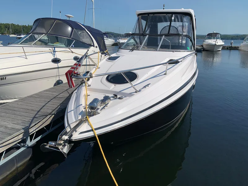 Slide: The Image of 2018 Regal 28 Express boat docked in marina. - 3